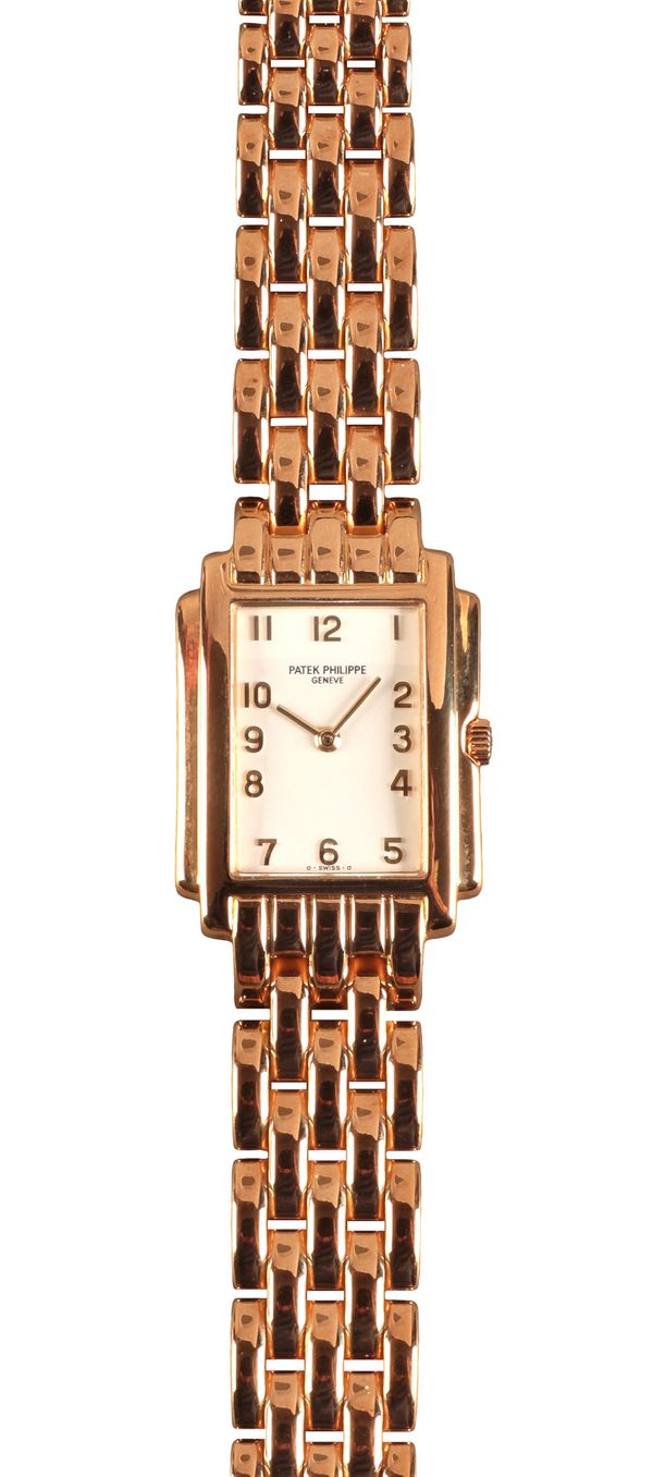 PATEK PHILIPPE: A LADY'S 18CT GOLD WRISTWATCH