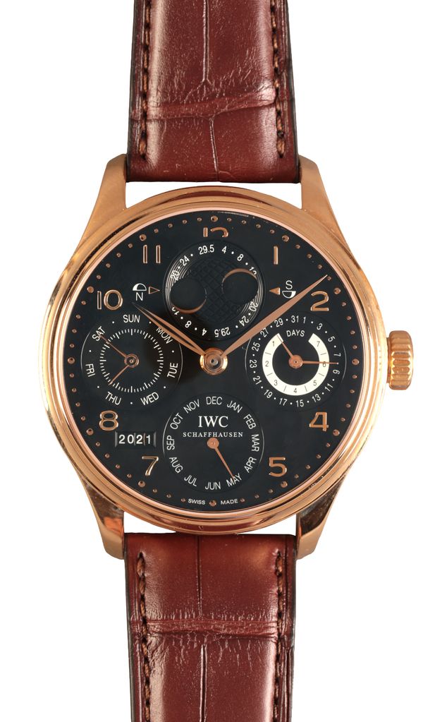 SOLD BY PRIVATE TREATY SALE:   IWC PORTUGIESER PERPETUAL CALENDAR: A GENTLEMAN'S 18CT GOLD WRISTWATCH