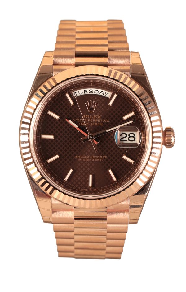 ROLEX OYSTER PERPETUAL DAY-DATE: A GENTLEMAN'S 18CT EVEROSE GOLD BRACELET WATCH