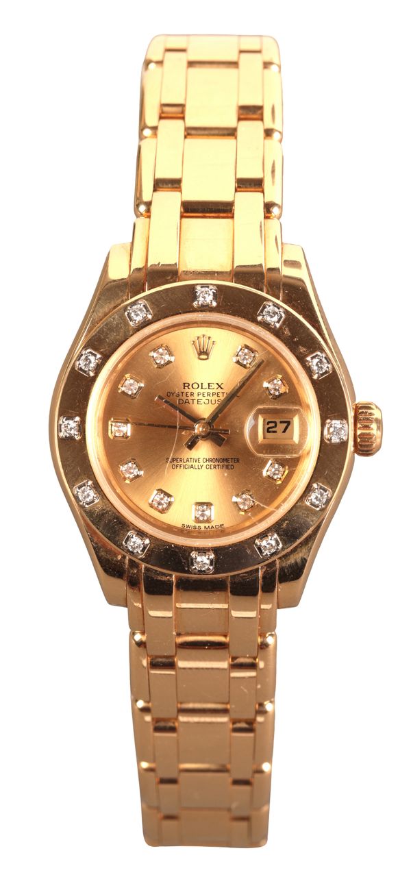 ROLEX OYSTER PERPETUAL DATEJUST: A LADY'S 18CT GOLD BRACELET WATCH