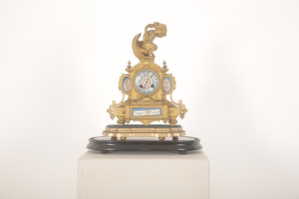 A FRENCH ORMOLU CHERUB CLOCK