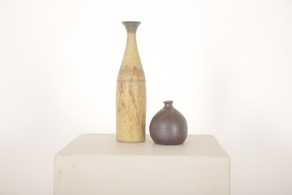 A STUDIO POTTERY BOTTLE SHAPED VASE