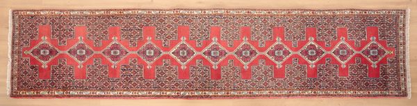 A NORTH WEST PERSIAN SENNEH RUNNER