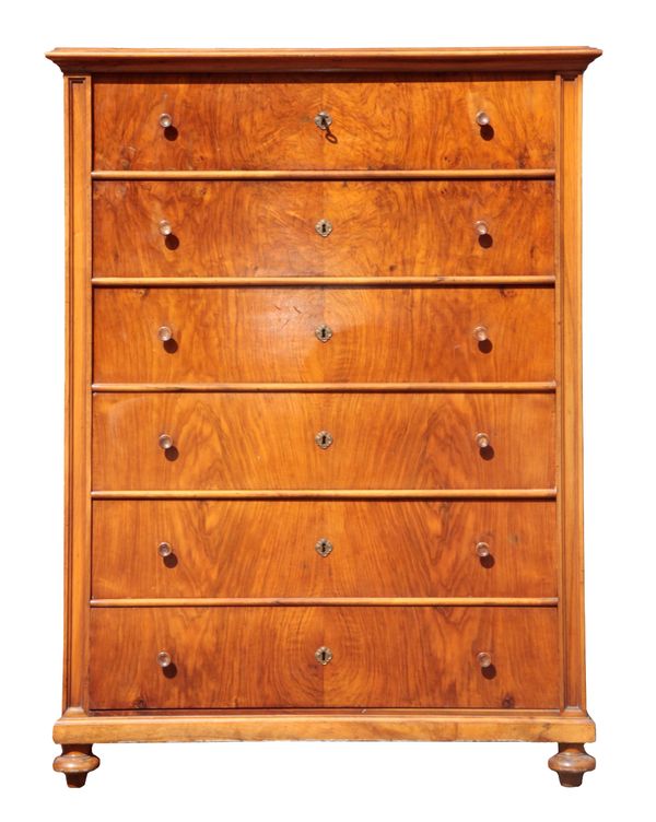 A LATE 19TH CENTURY CONTINENTAL FIGURED WALNUT CHEST OF DRAWERS OR SEMAINIER