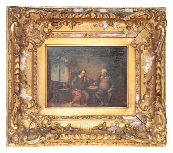MANNER OF DAVID TENIERS THE YOUNGER (1610-1690) Two revellers in an interior