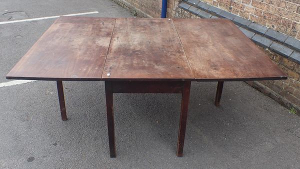 A GEORGE III MAHOGANY DROP-LEAF TABLE