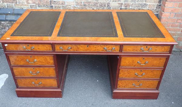 A YEW WOOD AND MAHOGANY DESK