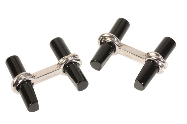 CARTIER: A PAIR OF ONYX TRINITY CUFFLINKS