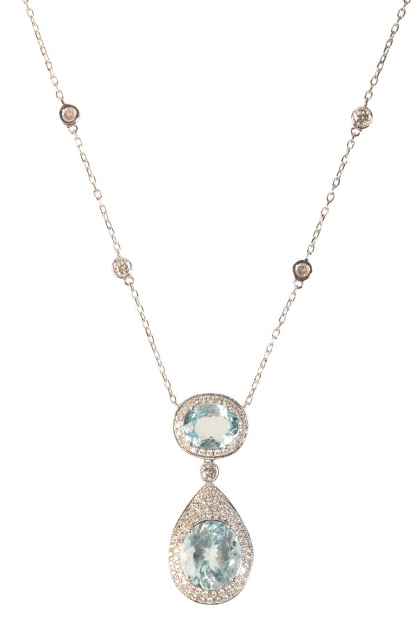 AN AQUAMARINE AND DIAMOND PENDANT NECKLACE