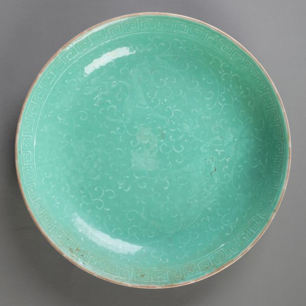 A CHINESE PORCELAIN APPLE GREEN PLATE
