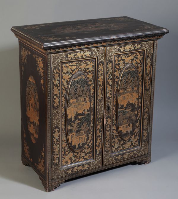 A CHINESE EXPORT BLACK LACQUER CABINET