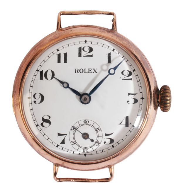 ROLEX: A GENTLEMAN'S 9CT GOLD TRENCH WATCH