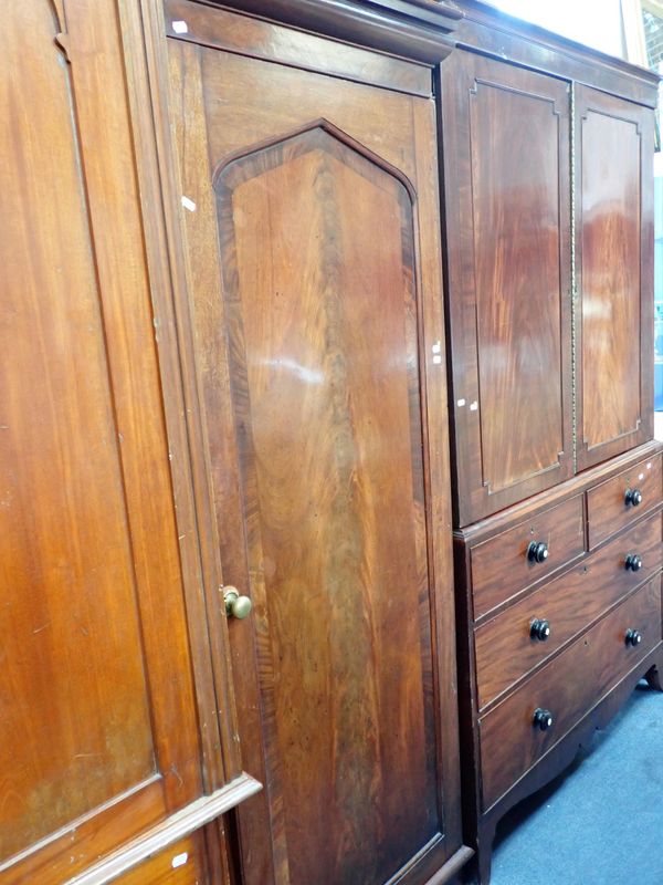 AN EARLY VICTORIAN MAHOGANY WARDROBE (altered)