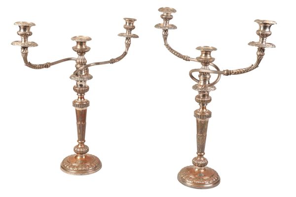 A PAIR OF SILVER-PLATED ON COPPER TRIPLE SCONCE CANDLEBRA