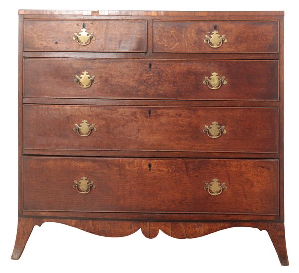 A GEORGE III OAK CHEST OF DRAWERS