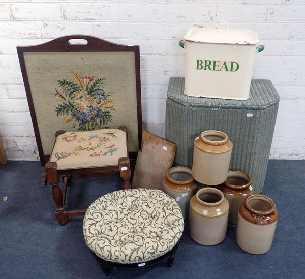 A LLOYD LOOM LINEN BASKET, AN ENAMEL BREAD BIN