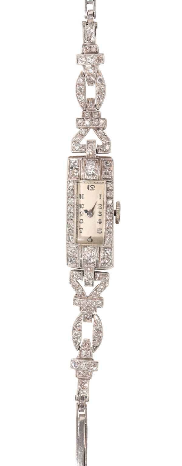 A LADY'S 18CT WHITE GOLD AND DIAMOND COCKTAIL WATCH