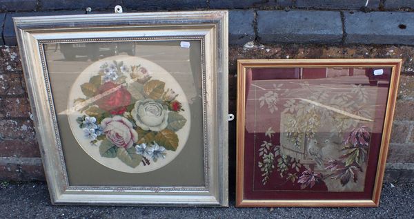 A FRAMED WOOLWORK AND BEADWORK FLORAL STUDY