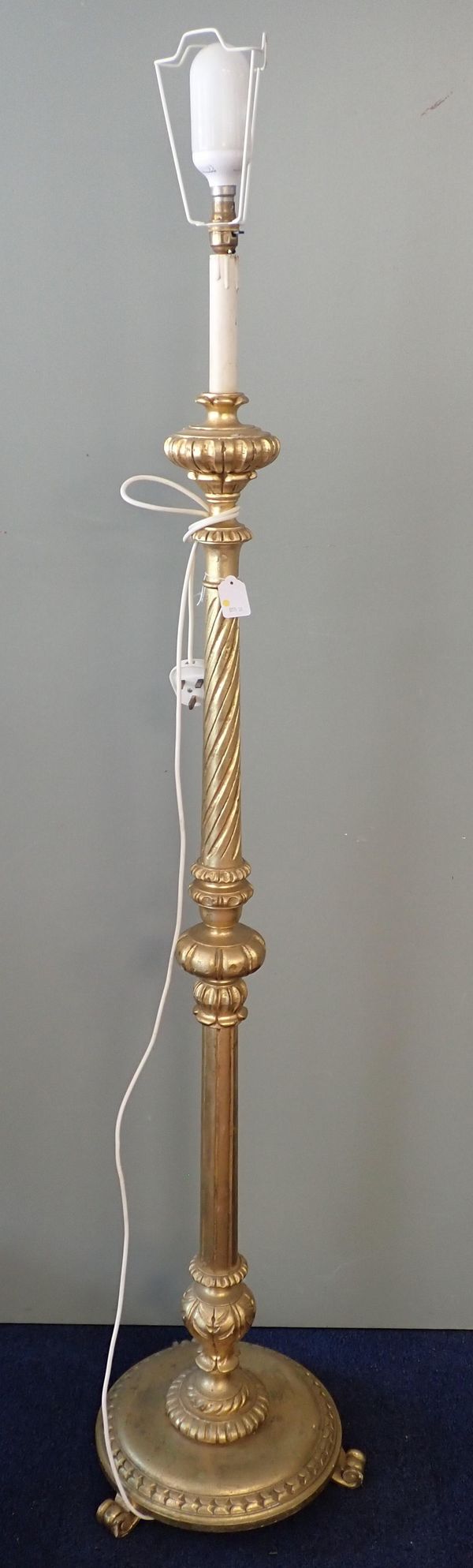 AN ITALIANATE GILTWOOD STANDARD LAMP