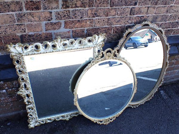 A  MOULDED, PAINTED AND GILT FRAMED MIRROR