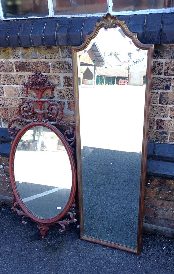 A MOULDED AND GILT FRAMED LONG MIRROR