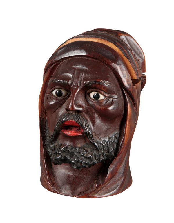 A CARVED BOXWOOD MOOR'S HEAD INKWELL