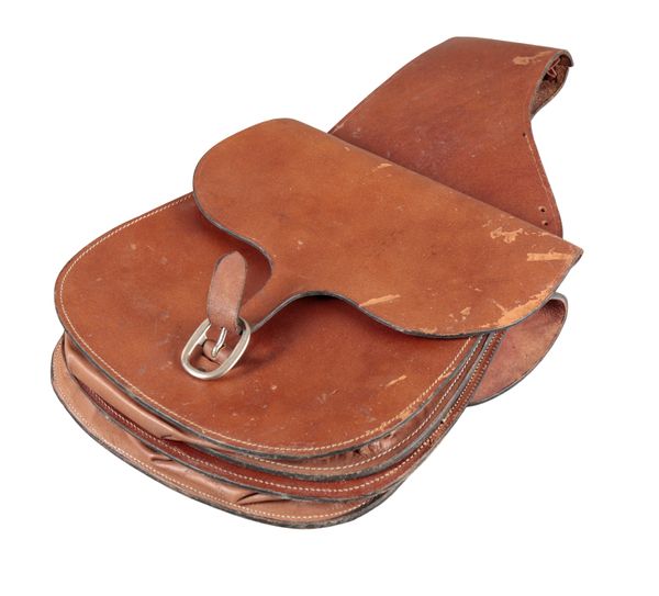 A PAIR OF BROWN LEATHER SADDLE BAGS