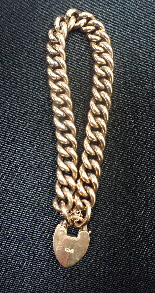 A 9CT GOLD CURB BRACELET