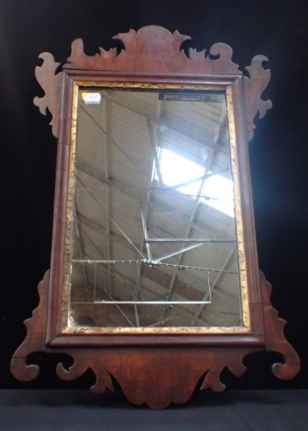 A GEORGE II MAHOGANY AND GILT MIRROR