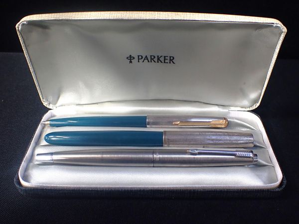 A VINTAGE STEEL PARKER PEN, AND OTHERS