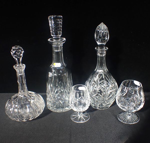 A WATERFORD DECANTER, OF MALLET SHAPE, AND GLASS