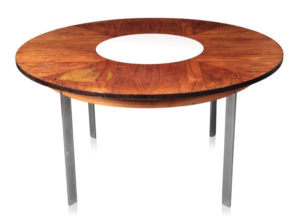 RICHARD YOUNG FOR MERROW ASSOCIATES: A ROSEWOOD DINING TABLE WITH CENTRAL INTEGRAL LAZY SUSAN