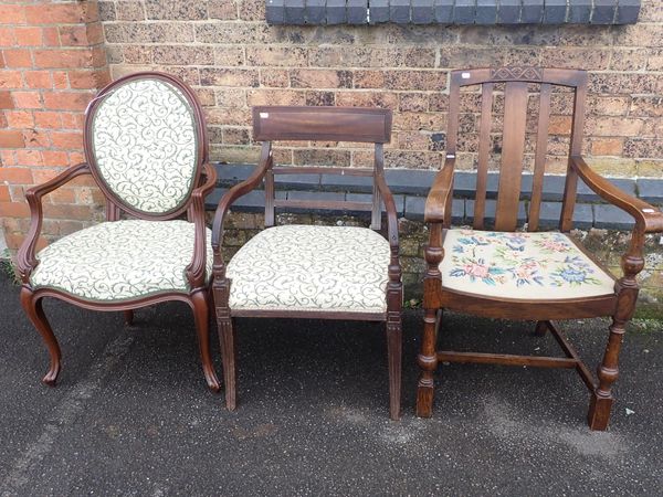 A REGENCY MAHOGANY ELBOW CHAIR