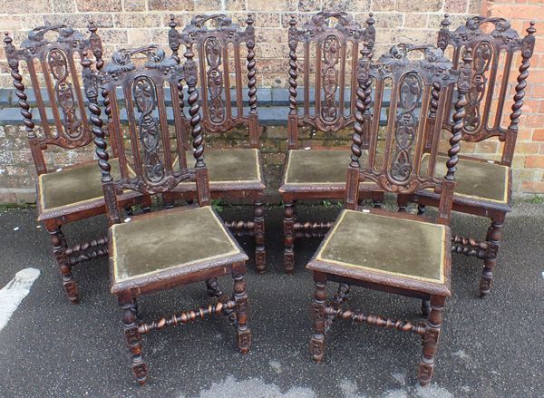 A SET OF SIX 19th CENTURY CARVED OAK CHAIRS