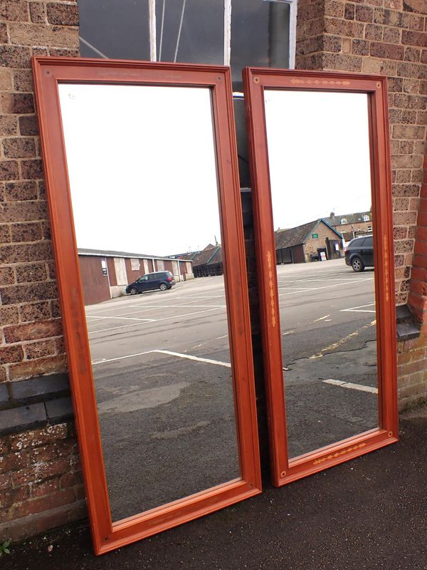 A LARGE PAIR OF WALL MIRRORS