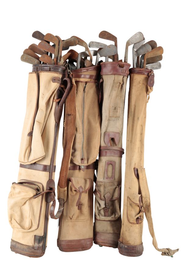 FOUR VINTAGE CANVAS AND LEATHER GOLF BAGS