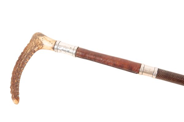 A GENTLEMAN'S RIDING CROP BY CHAMPION & WILTON, OXFORD ST., LONDON