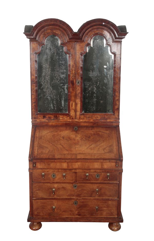 A WILLIAM AND MARY DOUBLE DOMED WALNUT BUREAU BOOKCASE