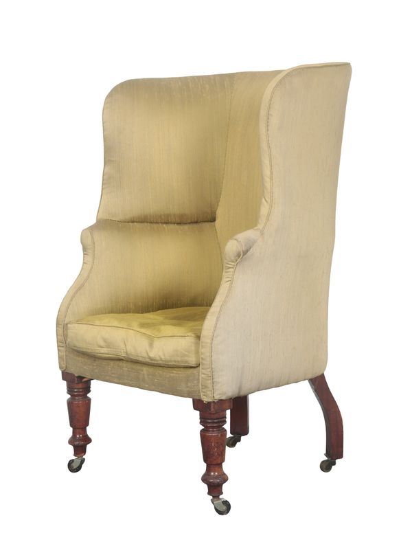 A MAHOGANY BARREL-BACK ARMCHAIR