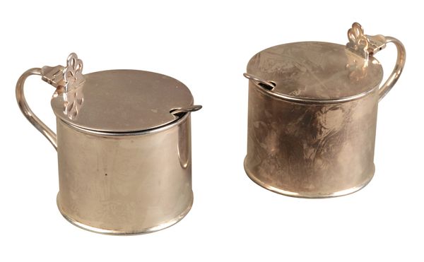 A PAIR OF GEORGE V SILVER LIDDED MUSTARDS