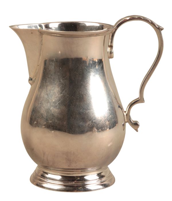 A GEORGE VI SILVER CREAM JUG