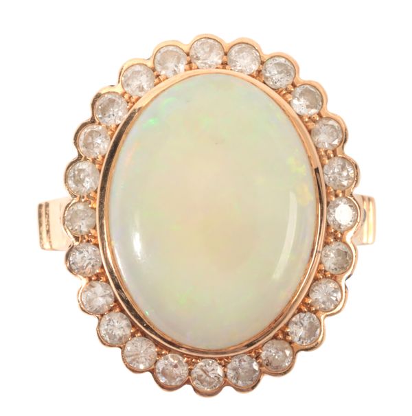 AN OPAL AND DIAMOND CLUSTER RING