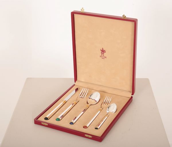 A SILVER-PLATED SINGLE CUTLERY PLACE SETTING BY PETER OF PARIS