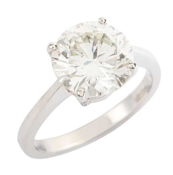A 3.97 CARAT DIAMOND SOLITAIRE RING