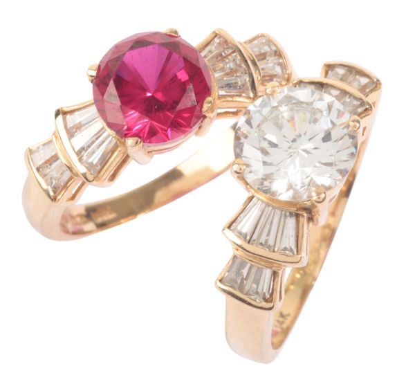 A MISMATCHED PAIR OF CUBIC ZIRCONIA RINGS