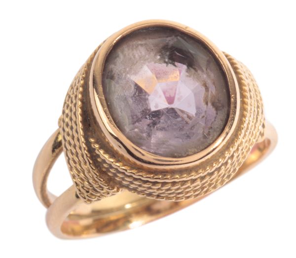 AN AMETHYST DRESS RING