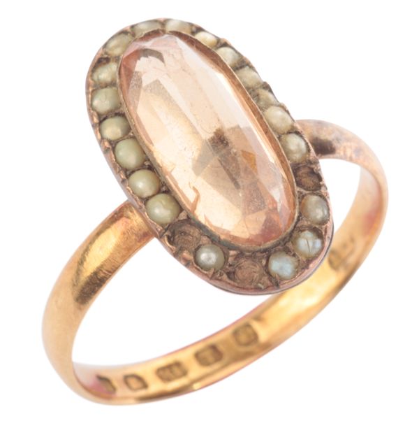 A TOPAZ AND PEARL CLUSTER RING