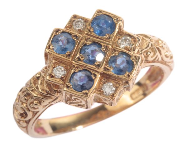 A SAPPHIRE AND DIAMOND CLUSTER RING