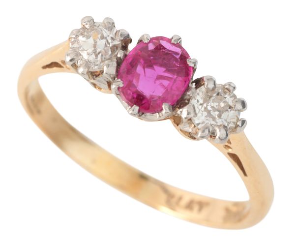A RUBY AND DIAMOND THREE STONE RING