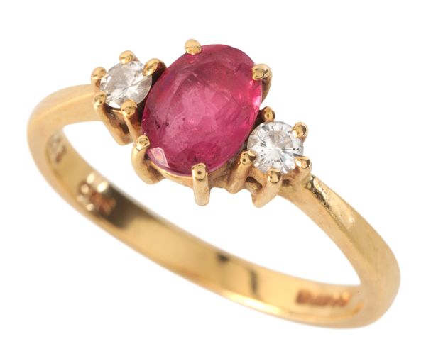 CROPP & FARR: A TOURMALINE AND DIAMOND THREE STONE RING